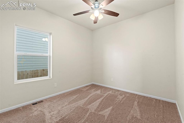 10067 Seawolf Dr, Colorado Springs, CO 80925 - spare room featuring carpet, baseboards, and ceiling fan