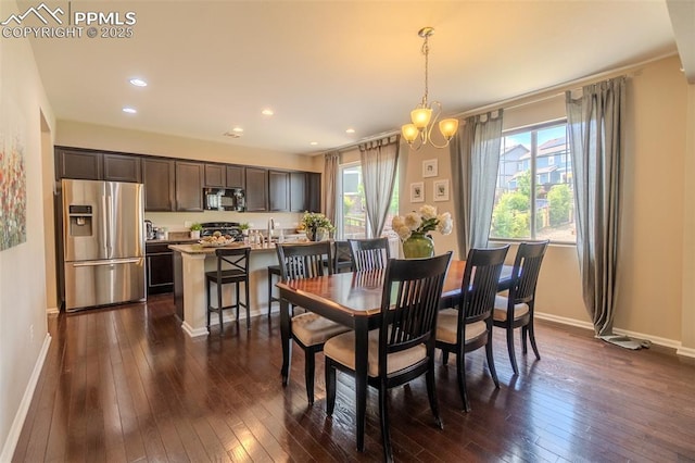 7312 Grady Cir, Castle Rock, CO 80108 - dining room with baseboards, dark wood-style flooring, and recessed lighting