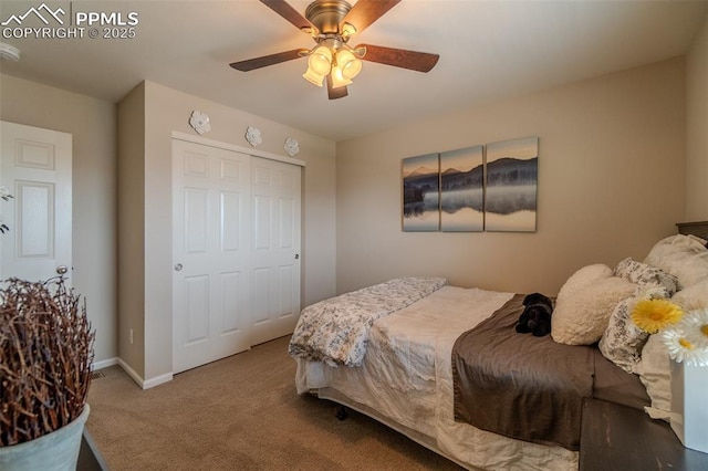 7312 Grady Cir, Castle Rock, CO 80108 - bedroom with carpet floors, baseboards, a ceiling fan, and a closet