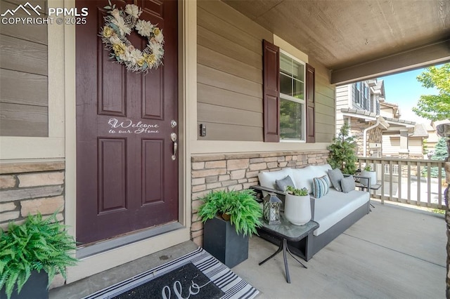 7312 Grady Cir, Castle Rock, CO 80108 - entrance to property with covered porch and stone siding