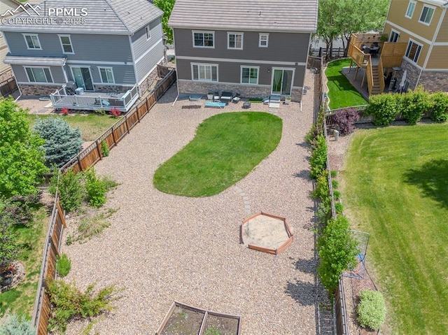 7312 Grady Cir, Castle Rock, CO 80108 - rear view of property with stone siding and a patio area