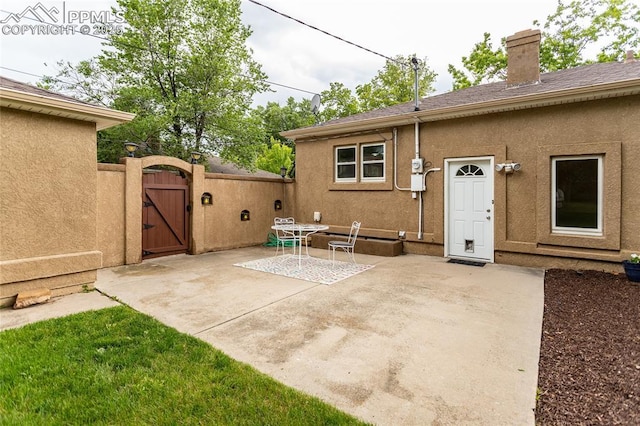 1017 N Sheridan Ave, Colorado Springs, CO 80909 - view of patio / terrace with a gate