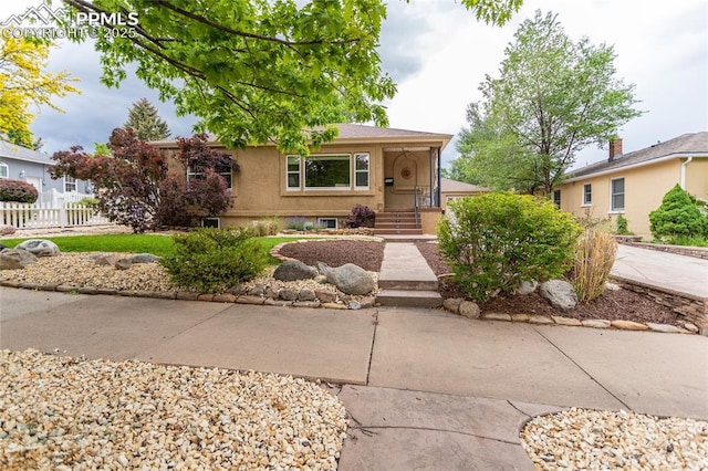 1017 N Sheridan Ave, Colorado Springs, CO 80909 - view of front facade featuring stucco siding