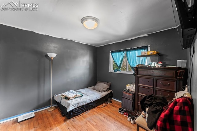 7210 Metropolitan St, Colorado Springs, CO 80911 - bedroom featuring wood finished floors and baseboards