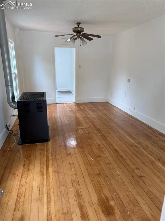 506 S Hancock Ave, Colorado Springs, CO 80903 - spare room featuring hardwood / wood-style floors, ceiling fan, and baseboards