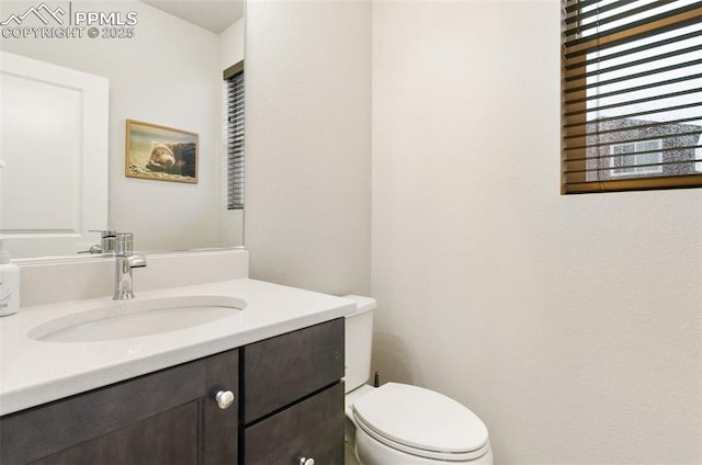 6697 Cool Breeze Dr, Colorado Springs, CO 80923 - bathroom featuring vanity and toilet