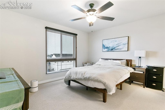 6697 Cool Breeze Dr, Colorado Springs, CO 80923 - bedroom featuring light colored carpet and a ceiling fan