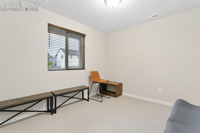 6697 Cool Breeze Dr, Colorado Springs, CO 80923 - living area featuring light colored carpet and baseboards