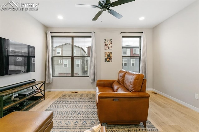 6697 Cool Breeze Dr, Colorado Springs, CO 80923 - living area featuring light wood-style floors, recessed lighting, and ceiling fan