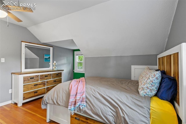 421 N Spruce St, Colorado Springs, CO 80905 - bedroom featuring lofted ceiling, wood finished floors, and a ceiling fan