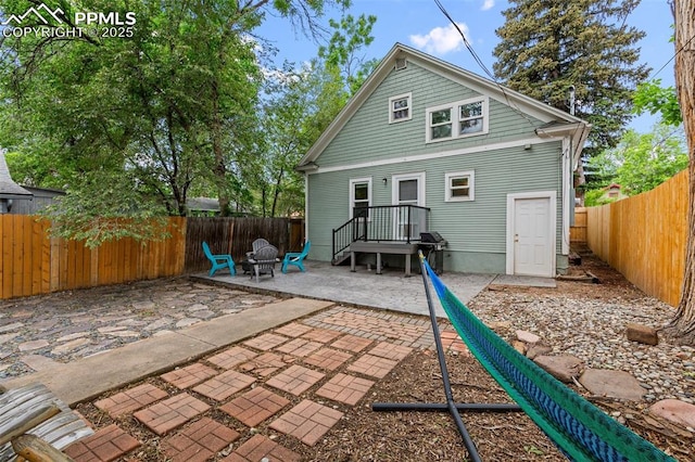 421 N Spruce St, Colorado Springs, CO 80905 - back of house featuring a patio and a fenced backyard