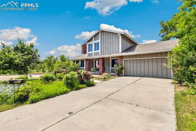 965 Red Mesa Dr, Colorado Springs, CO 80906 - traditional-style home featuring an attached garage, board and batten siding, and concrete driveway