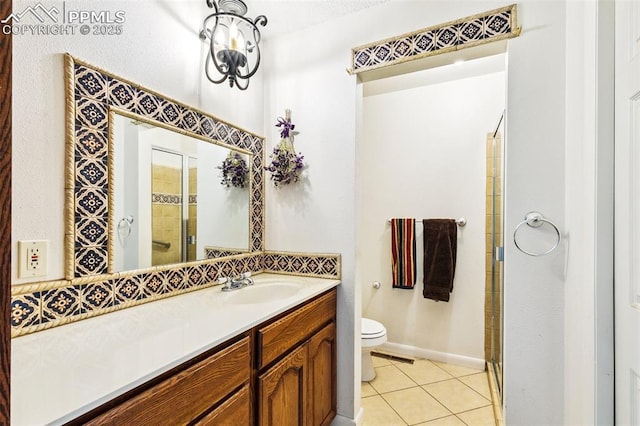 965 Red Mesa Dr, Colorado Springs, CO 80906 - full bathroom with tile patterned floors, a shower stall, and vanity