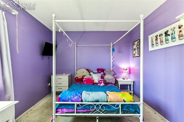 965 Red Mesa Dr, Colorado Springs, CO 80906 - bedroom featuring concrete flooring