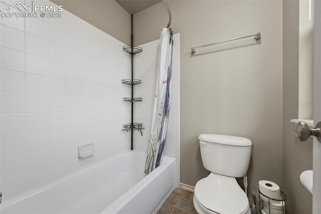 2374 Cinnabar Rd, Colorado Springs, CO 80921 - bathroom featuring toilet and shower / bathtub combination with curtain