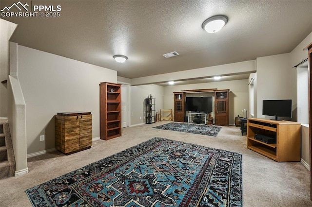 2374 Cinnabar Rd, Colorado Springs, CO 80921 - carpeted living room with a textured ceiling and baseboards