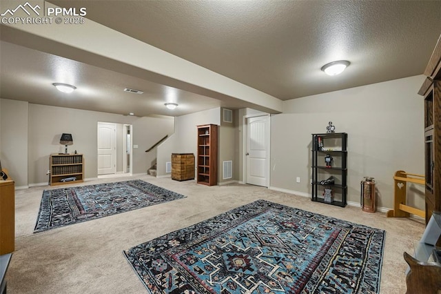 2374 Cinnabar Rd, Colorado Springs, CO 80921 - interior space featuring carpet flooring, stairway, and a textured ceiling
