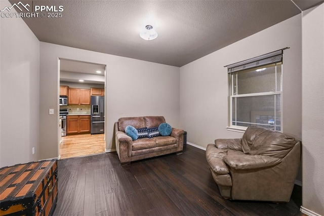 2374 Cinnabar Rd, Colorado Springs, CO 80921 - living area featuring hardwood / wood-style flooring and baseboards