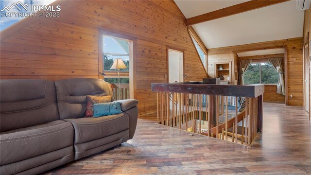 145 Valley Ln, Woodland Park, CO 80863 - living room with wooden walls and wood finished floors