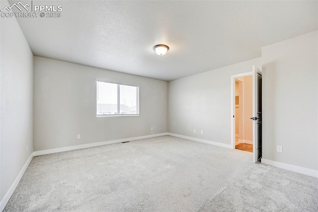 6967 Akela Ln, Colorado Springs, CO 80925 - empty room featuring carpet and baseboards
