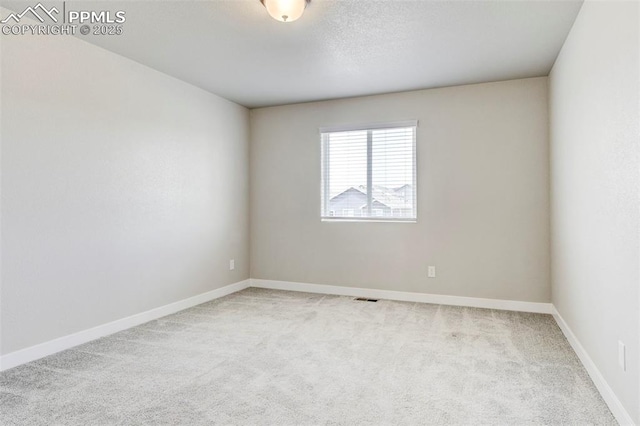 6967 Akela Ln, Colorado Springs, CO 80925 - unfurnished room featuring carpet floors and baseboards