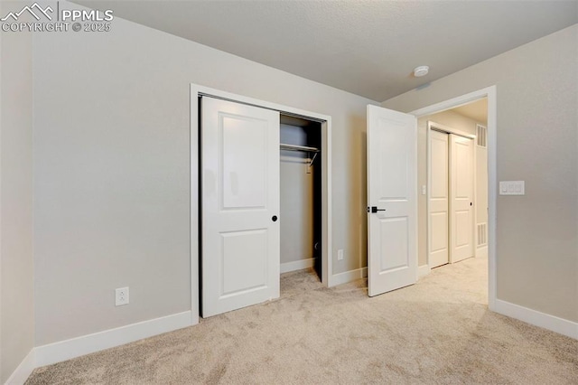 6967 Akela Ln, Colorado Springs, CO 80925 - unfurnished bedroom featuring carpet flooring, baseboards, and a closet