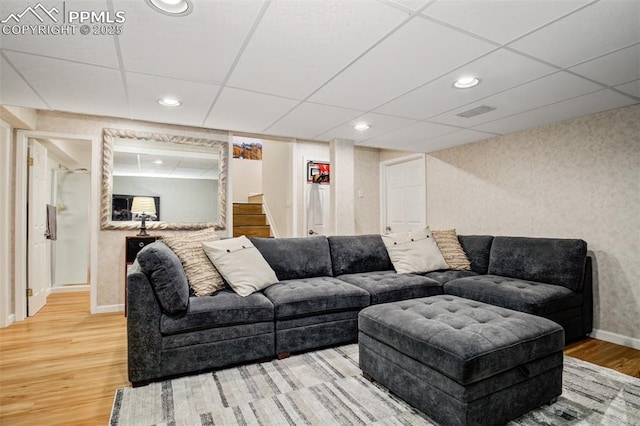 16084 Stonebriar Dr, Parker, CO 80134 - living room with wood finished floors, baseboards, recessed lighting, and stairs