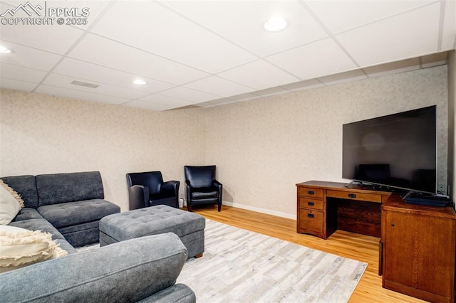 16084 Stonebriar Dr, Parker, CO 80134 - living room featuring wood finished floors, baseboards, wallpapered walls, a drop ceiling, and recessed lighting