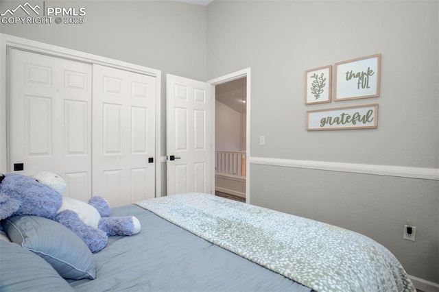 16084 Stonebriar Dr, Parker, CO 80134 - bedroom with a closet, baseboards, and vaulted ceiling