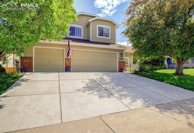16084 Stonebriar Dr, Parker, CO 80134 - view of front of property with brick siding, an attached garage, driveway, and a front lawn