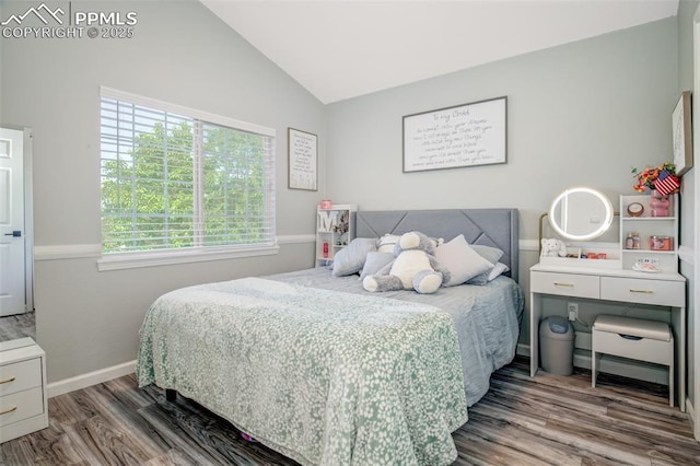 16084 Stonebriar Dr, Parker, CO 80134 - bedroom featuring wood finished floors, vaulted ceiling, and baseboards