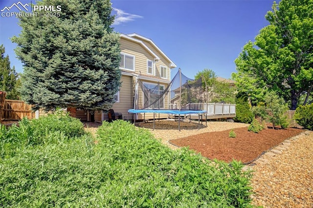 16084 Stonebriar Dr, Parker, CO 80134 - fenced yard featuring a trampoline