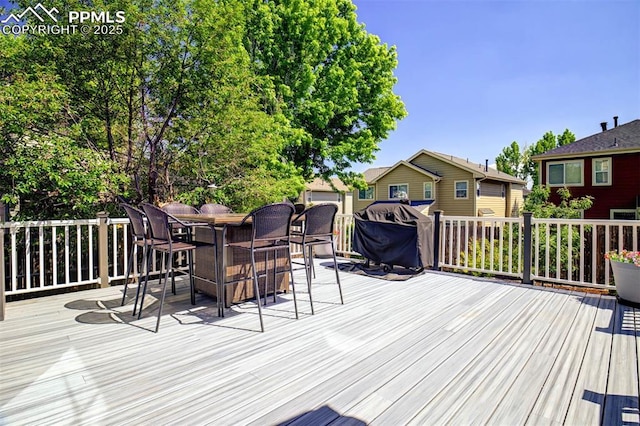 16084 Stonebriar Dr, Parker, CO 80134 - wooden terrace with outdoor dining area