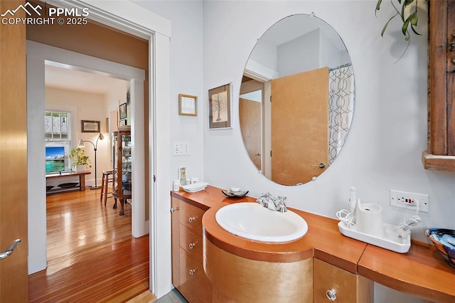 424 N Cedar St, Colorado Springs, CO 80903 - full bathroom with wood finished floors and vanity