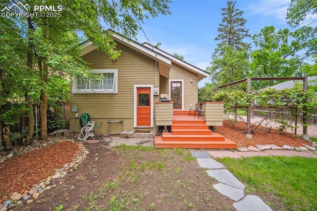 424 N Cedar St, Colorado Springs, CO 80903 - view of front of house with a wooden deck