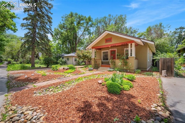 424 N Cedar St, Colorado Springs, CO 80903 - view of front of property featuring a porch