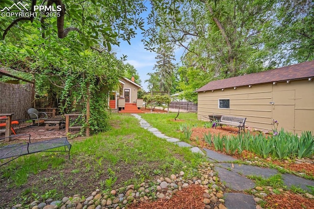 424 N Cedar St, Colorado Springs, CO 80903 - view of yard featuring a patio and entry steps