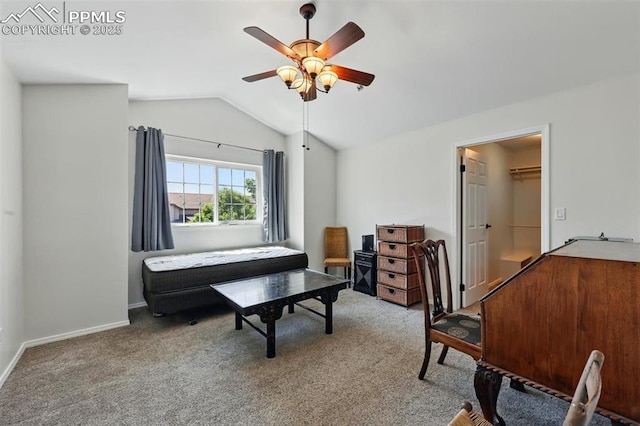 2150 Alicia Pt Unit 201, Colorado Springs, CO 80919 - sitting room with vaulted ceiling, a ceiling fan, carpet flooring, and baseboards