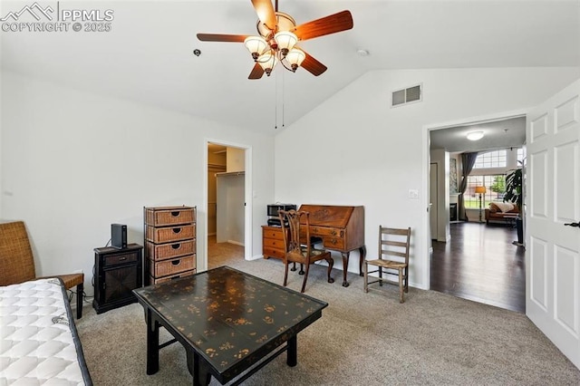 2150 Alicia Pt Unit 201, Colorado Springs, CO 80919 - living room featuring a ceiling fan, carpet flooring, and high vaulted ceiling