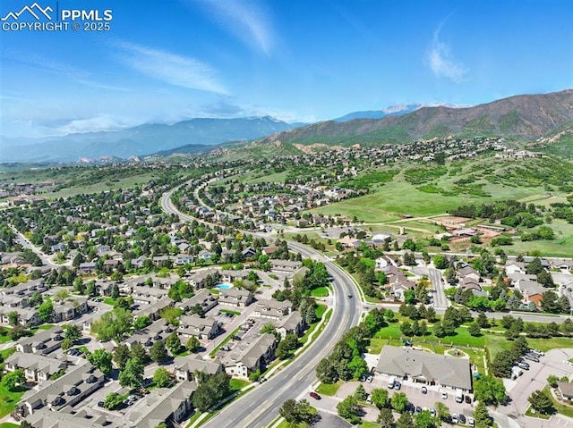 2150 Alicia Pt Unit 201, Colorado Springs, CO 80919 - aerial view of property and surrounding area featuring mountains and nearby suburban area