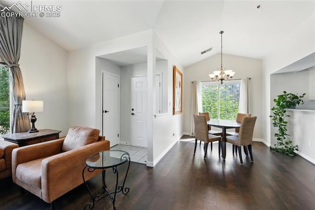 2150 Alicia Pt Unit 201, Colorado Springs, CO 80919 - living area featuring a chandelier, wood finished floors, lofted ceiling, and baseboards