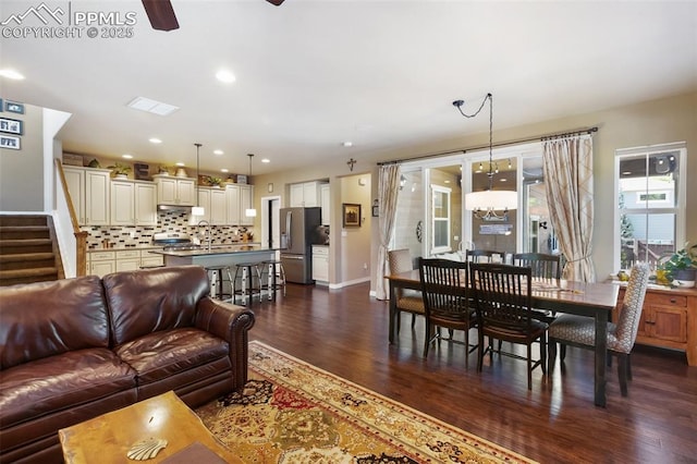 1593 Gold Hill Mesa Dr, Colorado Springs, CO 80905 - living room with dark wood-style flooring, ceiling fan, stairway, and recessed lighting