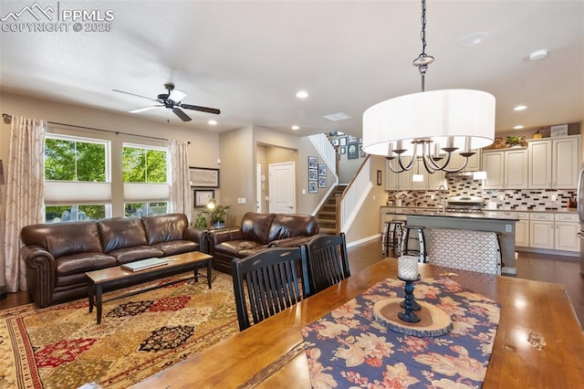 1593 Gold Hill Mesa Dr, Colorado Springs, CO 80905 - living room with wood finished floors, a ceiling fan, stairway, and recessed lighting