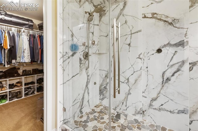 1593 Gold Hill Mesa Dr, Colorado Springs, CO 80905 - bathroom featuring a marble finish shower and a walk in closet