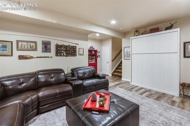 1593 Gold Hill Mesa Dr, Colorado Springs, CO 80905 - living room featuring wood finished floors, stairway, and recessed lighting