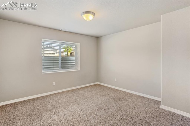 10897 Hidden Brook Cir, Colorado Springs, CO 80908 - unfurnished room with carpet and baseboards