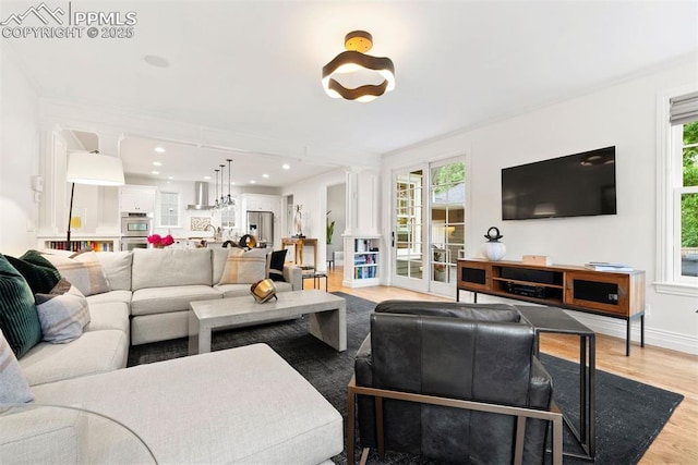 3 Mesa Ln, Colorado Springs, CO 80906 - living area with light wood-type flooring and baseboards