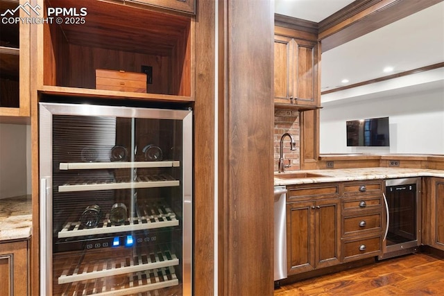 3 Mesa Ln, Colorado Springs, CO 80906 - bar area featuring beverage cooler, dark wood-style flooring, crown molding, and recessed lighting