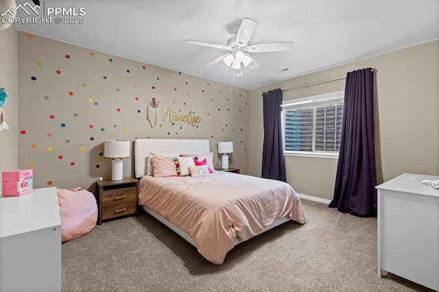 1734 Summerglow Ln, Monument, CO 80132 - bedroom featuring light carpet, a ceiling fan, and baseboards