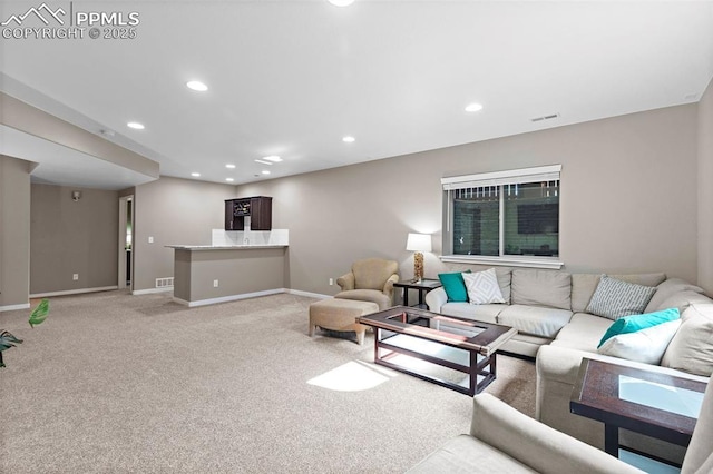 1734 Summerglow Ln, Monument, CO 80132 - living area with light carpet, recessed lighting, and baseboards